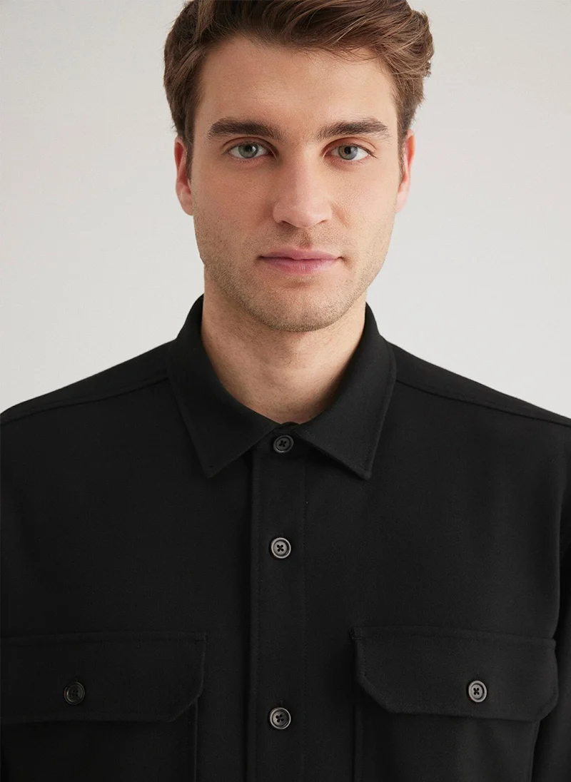 مافي قميص أسود