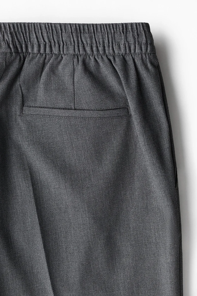 اتش اند ام بنطلون بكسرات على الساق وقصّة سلِم