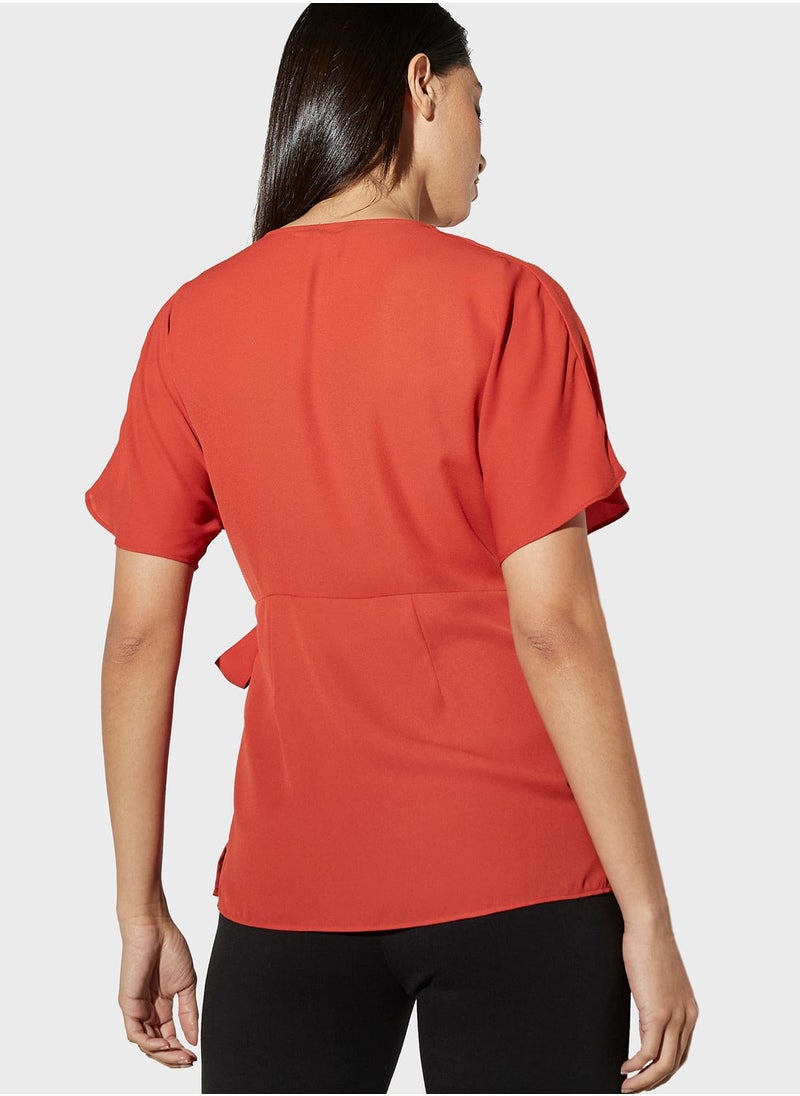 Iconic - Surplice Neck Wrap Top - Image 1
