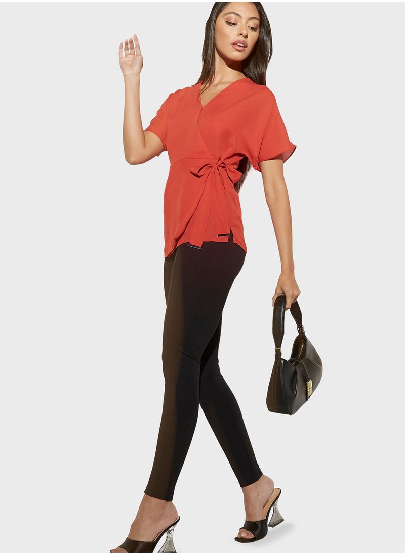 Iconic - Surplice Neck Wrap Top - Image 1