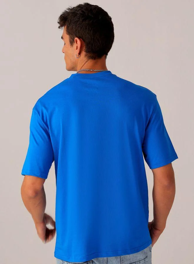 ذا انديان كراج كو Men Boxy Oversized Graphic Back Printed Round Neck Tshirt