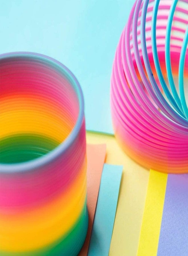 YOOKO® (1 Pcs) Rainbow Magic Spring Toy for Kids - Colorful Plastic Slinky Coil Spring Toy, Stretchable Walking Spring Toy for Kids Fun, Party Favor & Stress Relief - Image 2