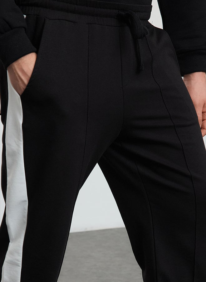 trendyol Black Oversize/Wide Cut Open Leg Color Block Sweatpants TMNAW25EA00006  - Image 4