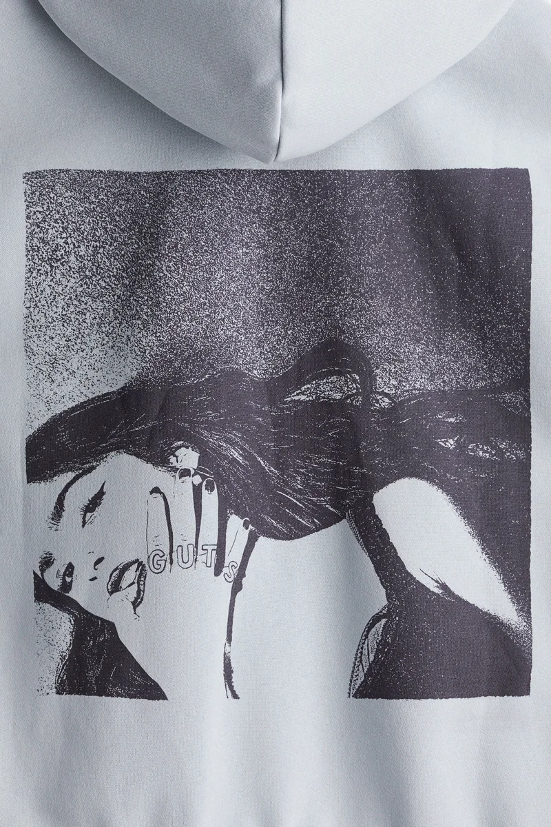 اتش اند ام هودي فضفاض بسحّاب ورسومات