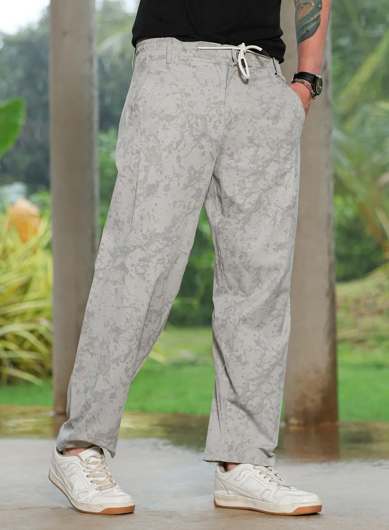 Campus Sutra  Men Splatter-Imprint Straight-Fit Trousers | Mid-Rise, Elasticated Stretch | Drawstring , Straight Hem | Abstract Print Twill | Woven Fabric For Casual & Street Wear | Coin Grey for Men | Best Price UAE