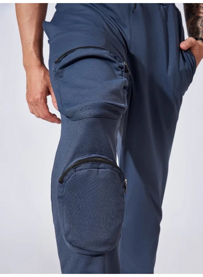 مانياك بنطلون كارغو رجالي بقصة ضيقة بجيوب جانبية بلون رمادي داكن من نسيج فرنسي تيري بوليستر 90% وسباندكس 10%