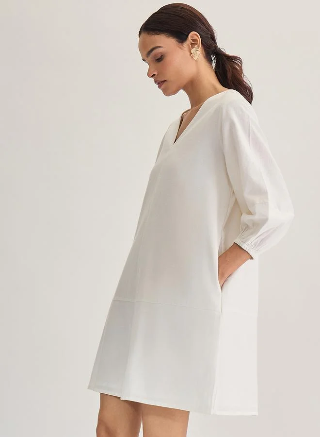 فيميلا فستان قصير من قماش قطني وكتان بأكمام بطول 3/4