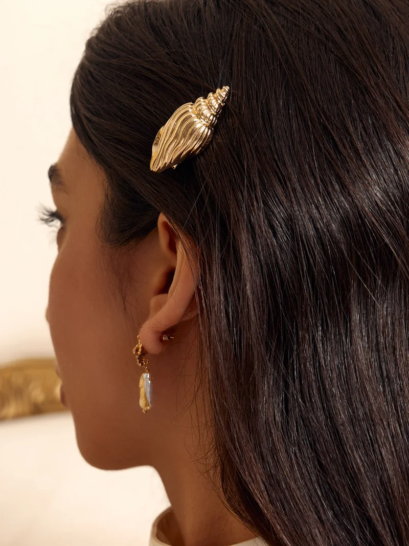 ليتشي مشبك شعر ذهبي بديكور بحري