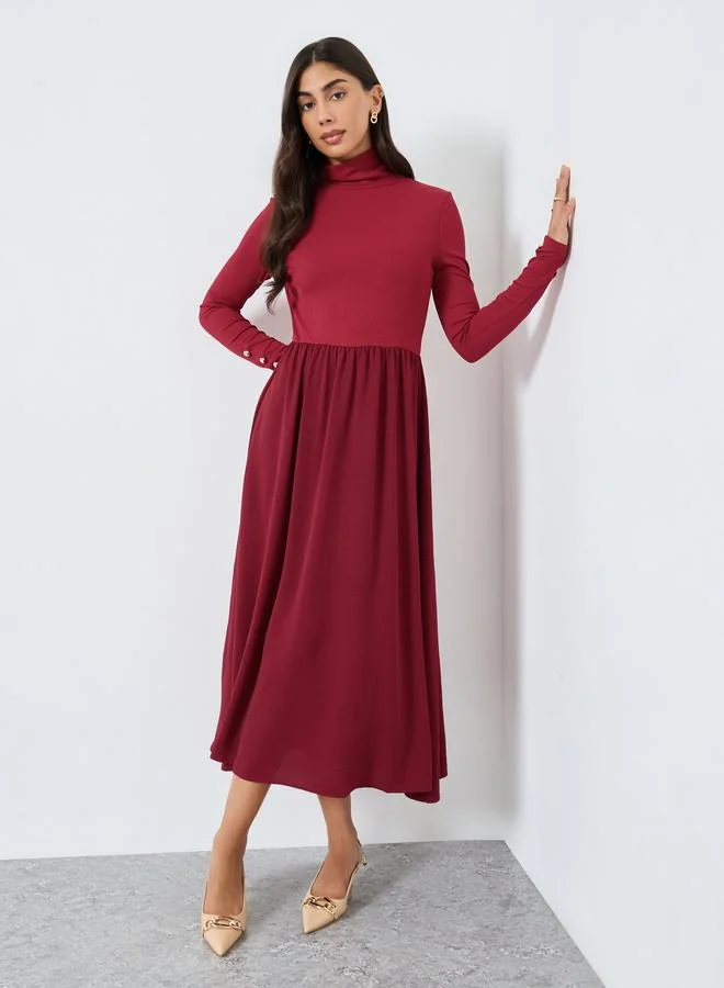 ستايلي فستان ميدي مضلع بياقة عالية