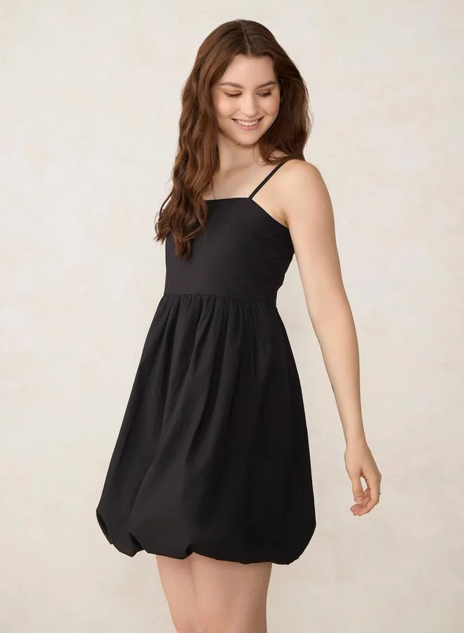 Outzidr  Black Solid Bubble Hem Mini Dress for Women | Best Price UAE