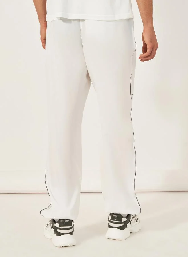Styli 4-Way Stretch Woven Cargo Fit Training Track Pants with Contrast Piping Detail