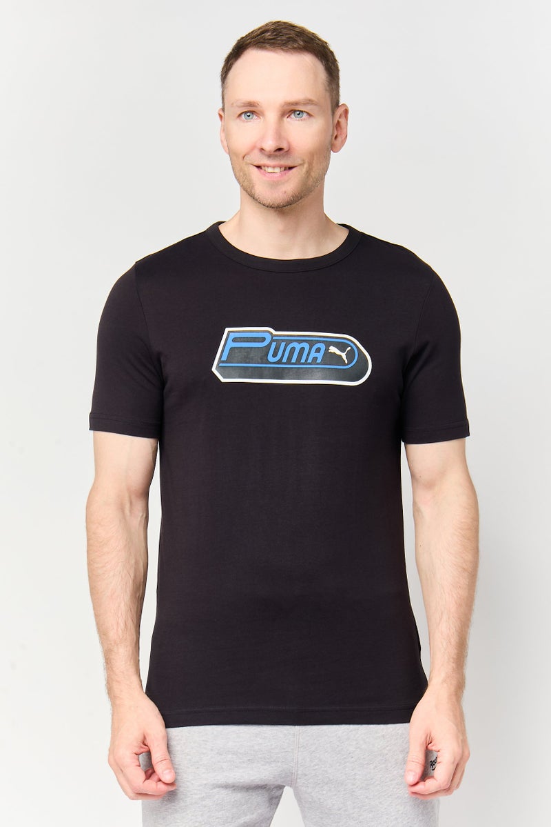 PUMA Men Sportswear Fit Short Sleeve Future Archive Outdoor T-Shirt, Black - Image 1