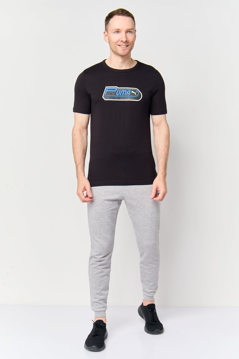 PUMA Men Sportswear Fit Short Sleeve Future Archive Outdoor T-Shirt, Black - Image 4