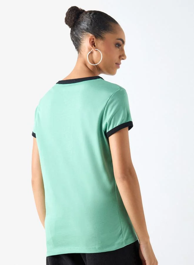 Lee Cooper  Lee Cooper Graphic Print Crew Neck Cotton T-shirt with Short Sleeves for Women | Best Price UAE