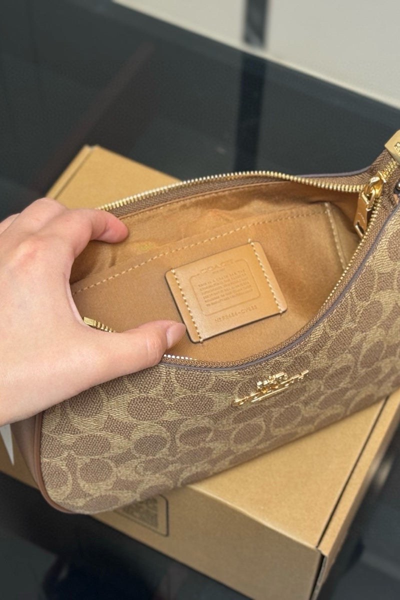 كوتش اوت ليت حقيبة كتف TERI ذات شعار كلاسيكي للمدرب، حقيبة كروس بودي، حقيبة يد - Image 5