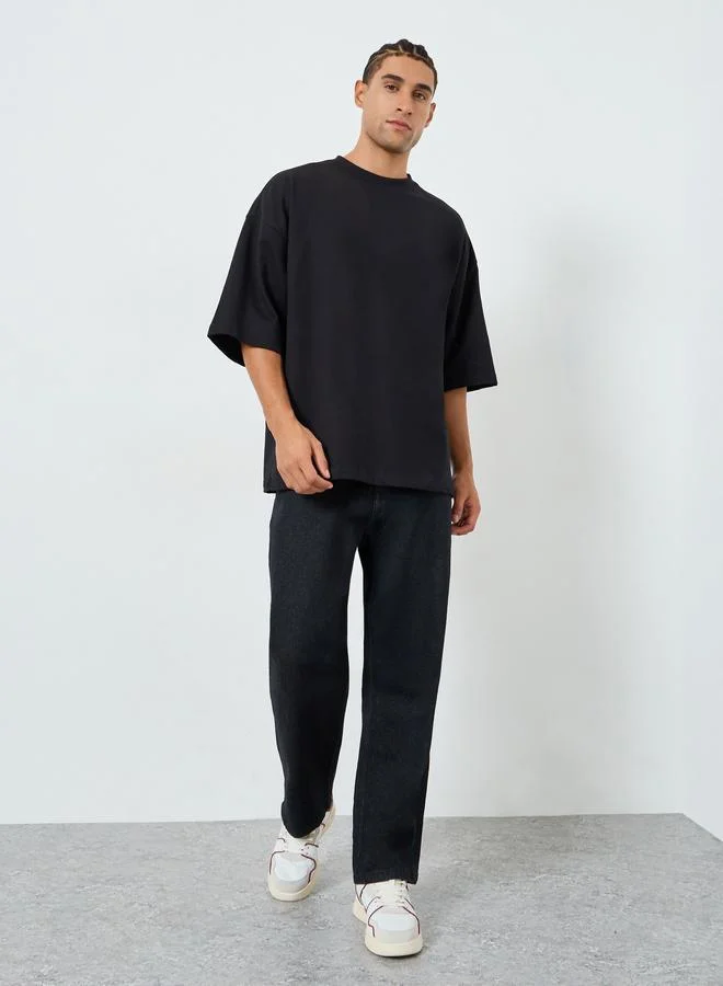 Styli Men Black Boxy Fit Embossed Print T-Shirt