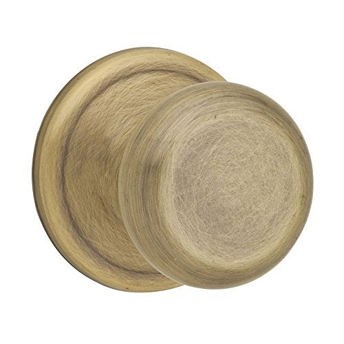 Kwikset Juno Interior Passage Door Knob, Handle For Closet and Hallway Doors, Non-Locking Doorknob in Antique Brass, with Microban Protection - Image 1