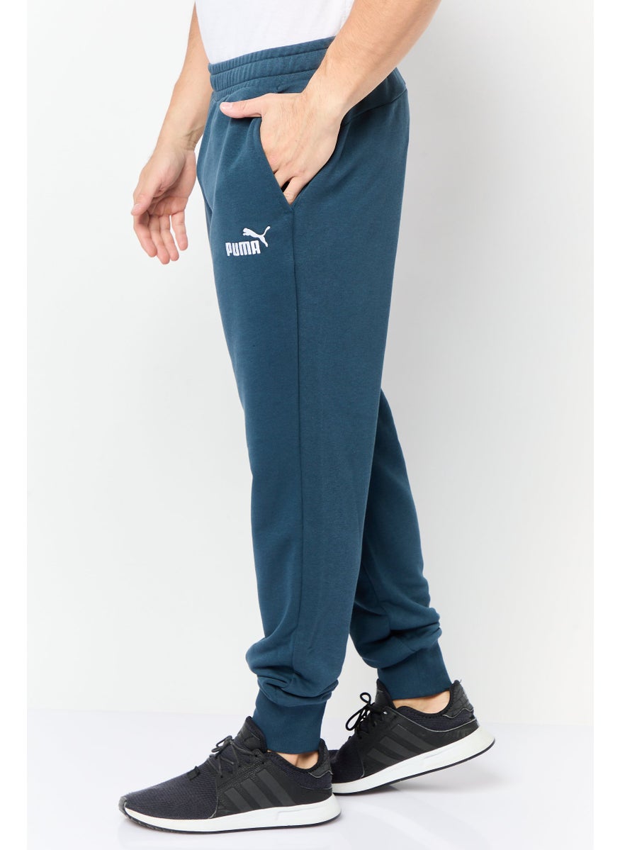 PUMA Men Sportswear Fit Brand Logo Outdoor Sweatpants, Slate Blue  - Image 2