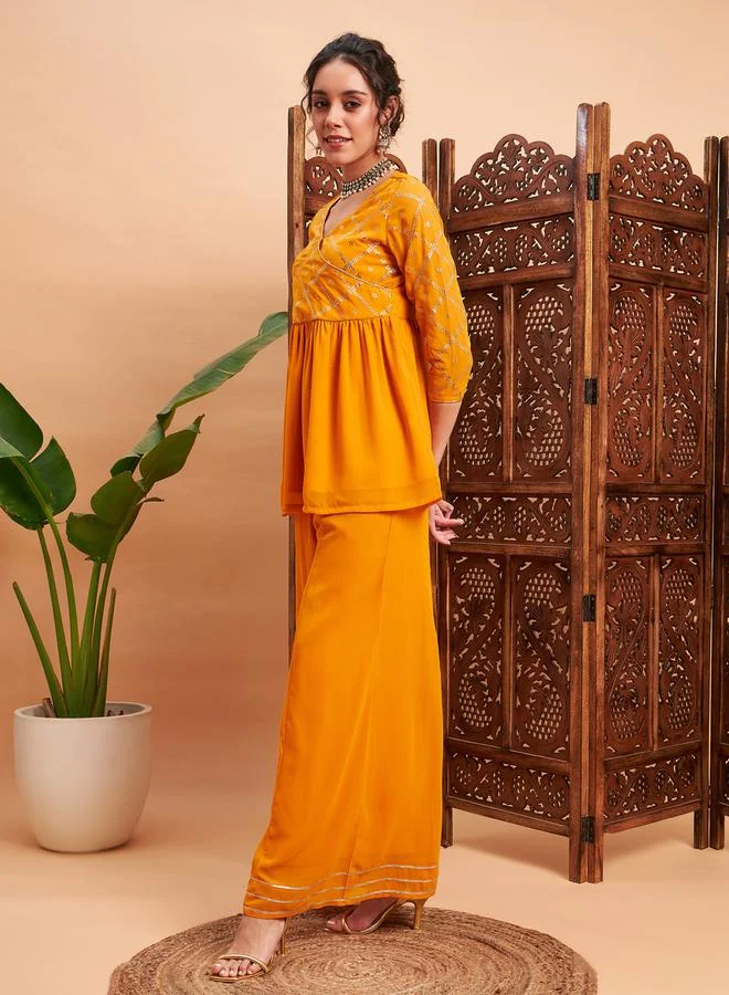 SASSAFRAS Embellished Gathered Detail Peplum Top and Wide Leg Pants Co-ords by Styli
