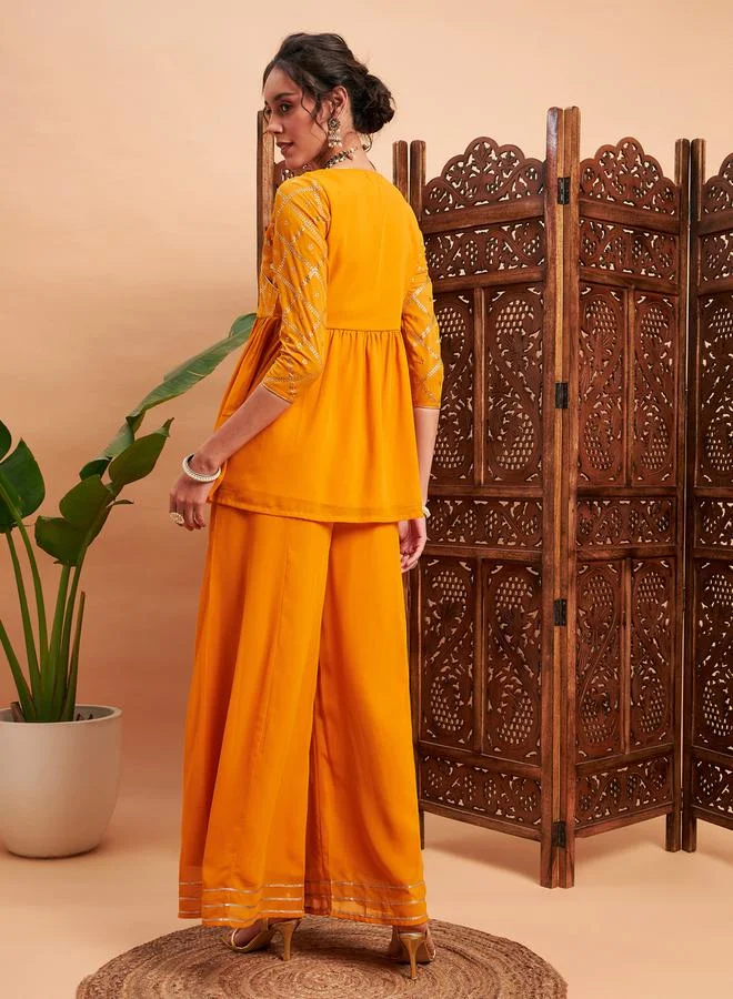 SASSAFRAS Embellished Gathered Detail Peplum Top and Wide Leg Pants Co-ords by Styli