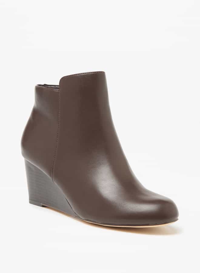 Flora Bella By Shoexpress Women Solid Ankle Boots with Zip Closure and Wedge Heels  - Image 1
