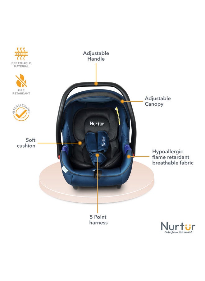 Nurtur - حاملة الأطفال نيمو، مظلة قابلة للتعديل ومقبض حماية إضافية، حزام أمان ثلاثي النقاط مناسب من 0 شهرًا إلى 12 شهرًا حتى 13 كجم، منتج رسمي أزرق - Image 1