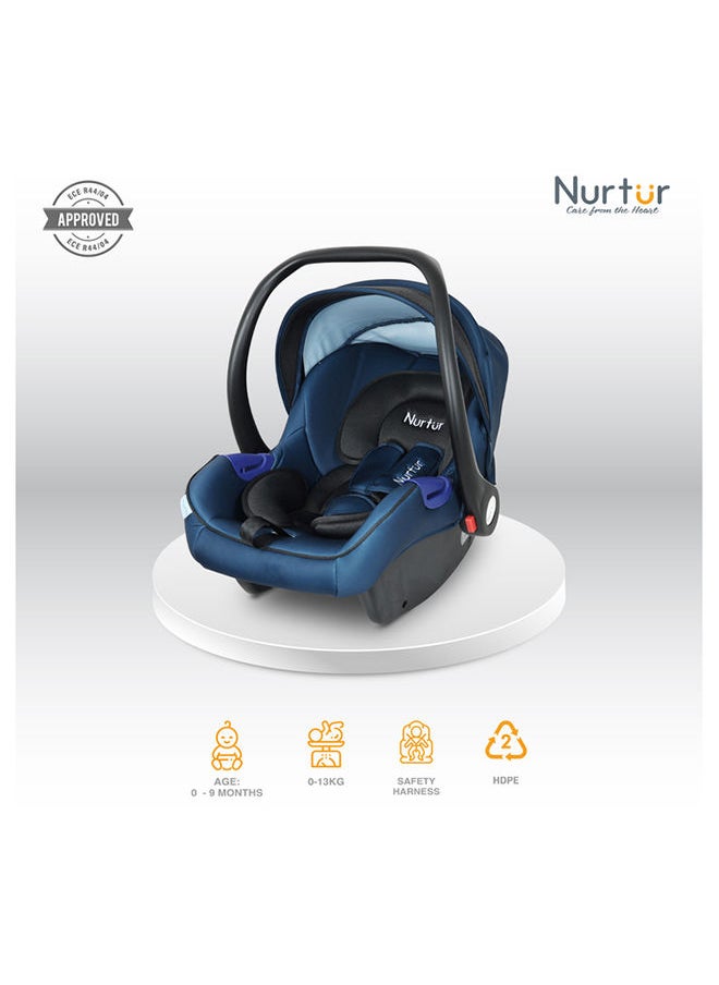 Nurtur - حاملة الأطفال نيمو، مظلة قابلة للتعديل ومقبض حماية إضافية، حزام أمان ثلاثي النقاط مناسب من 0 شهرًا إلى 12 شهرًا حتى 13 كجم، منتج رسمي أزرق - Image 1