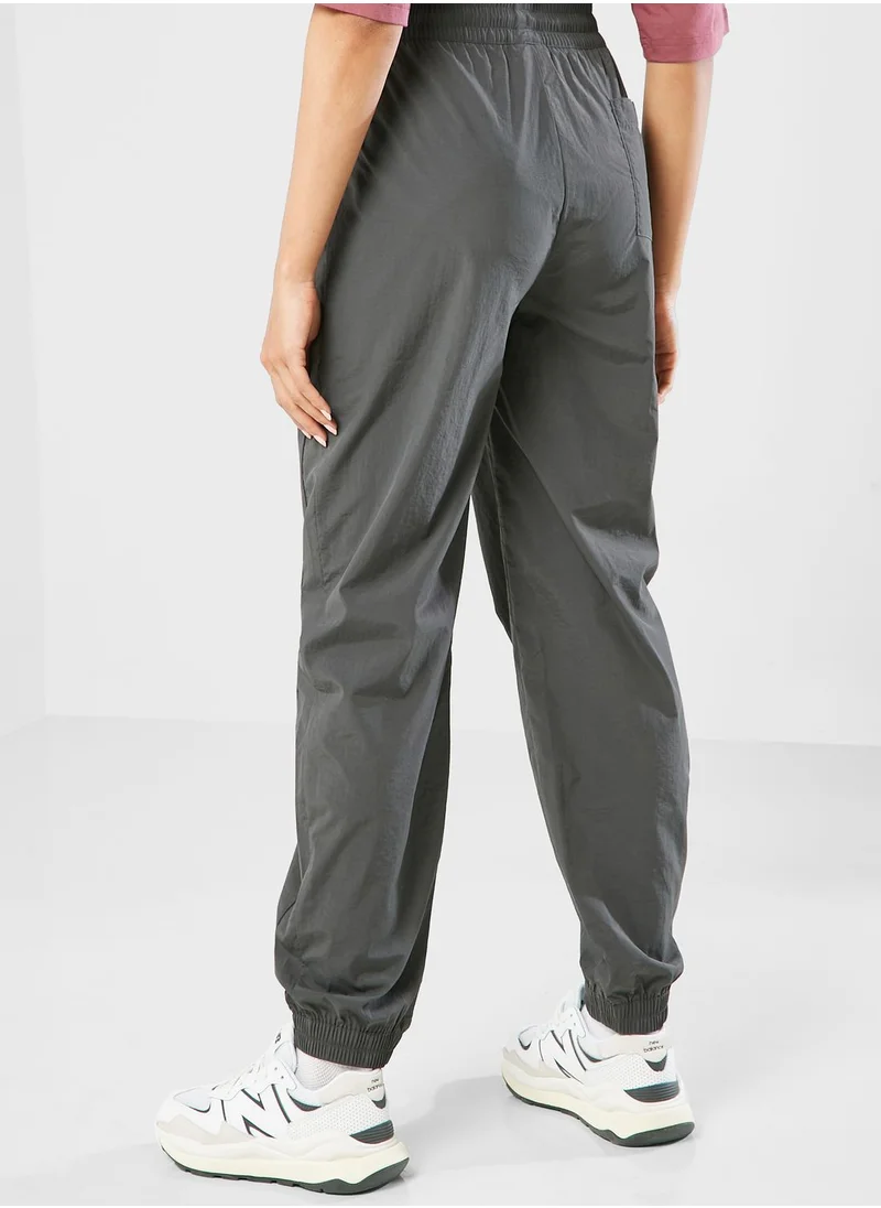 New Balance Athletics Woven Pants