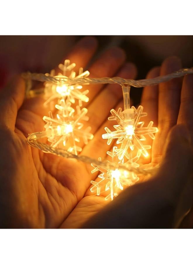ضوء ندفة الثلج يعمل بالبطارية مقاوم للماء 40 LED 6M أضواء حديقة الجنية لعيد الميلاد ومهرجان المنزل وزينة الحفلات - Image 2