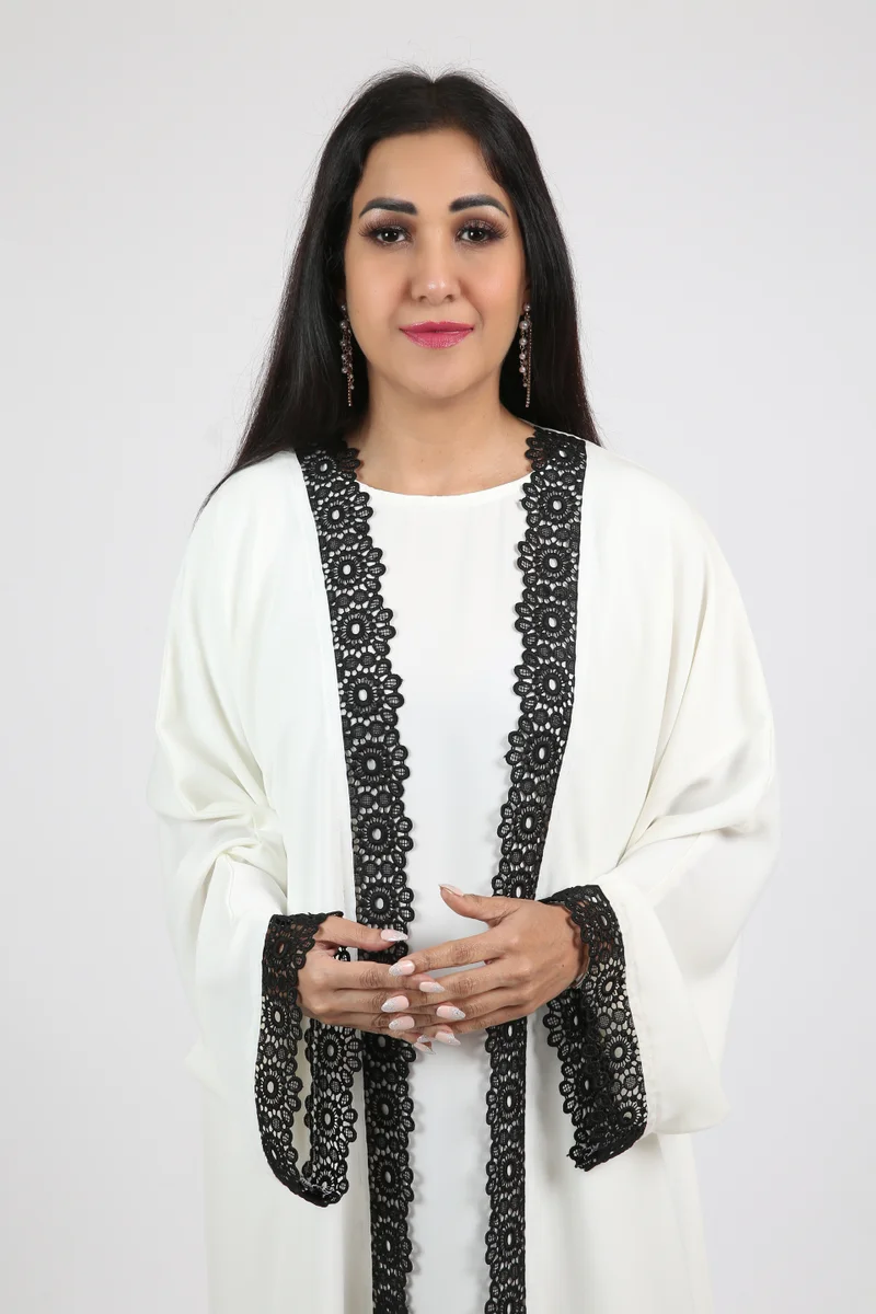 Nikias  White nida abaya with inner and black lace on sleeves and front.delicate abaya for work and formal occasions. for Women | Best Price UAE