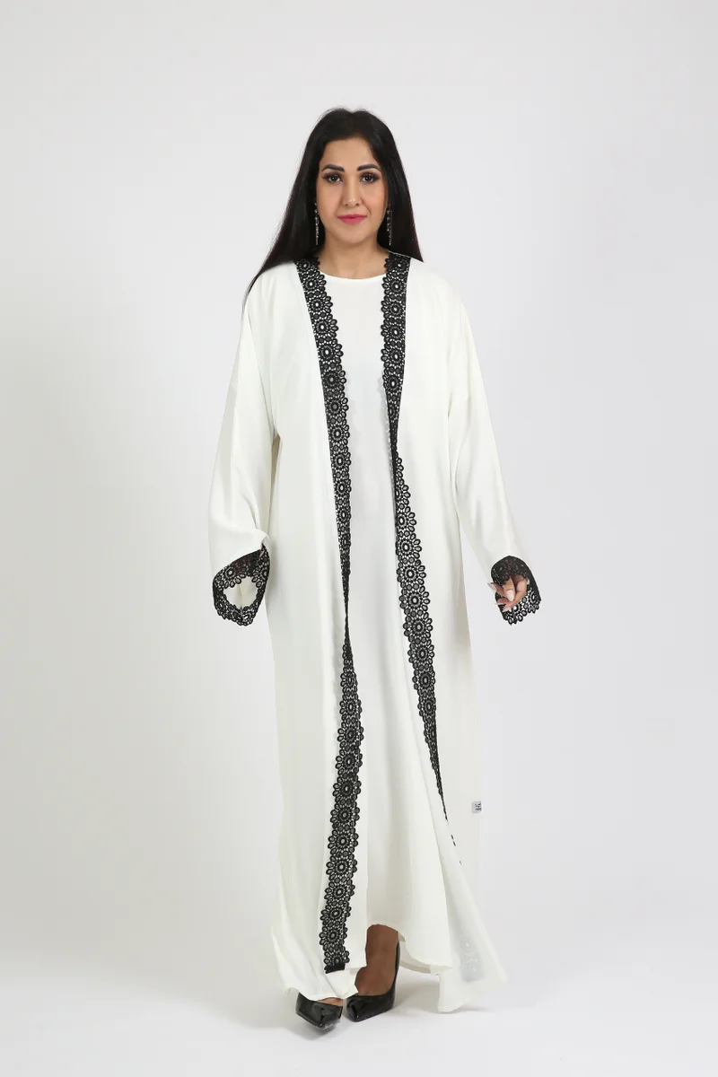 Nikias  White nida abaya with inner and black lace on sleeves and front.delicate abaya for work and formal occasions. for Women | Best Price UAE