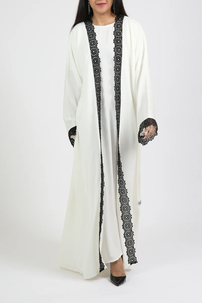 Nikias  White nida abaya with inner and black lace on sleeves and front.delicate abaya for work and formal occasions. for Women | Best Price UAE