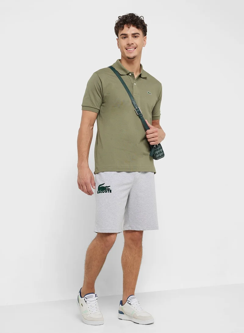 LACOSTE  Classic Fit Original Piqué Polo Shirt for Men | Best Price UAE