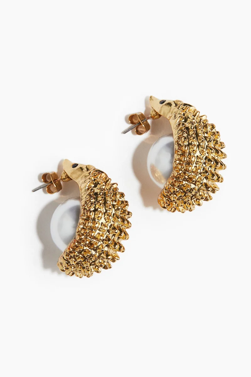 اتش اند ام حلق مزيّن بالخرز