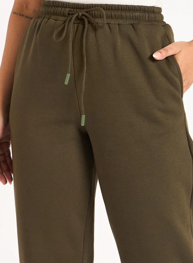 Femmella  Women Olive Fleece Joggers for Women | Best Price UAE