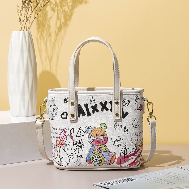 Bag Women'S Crossbody Bag Graffiti Bucket Bag Simple Cylinder Bag Bear Letter Vegetable Basket Handbag - Image 1