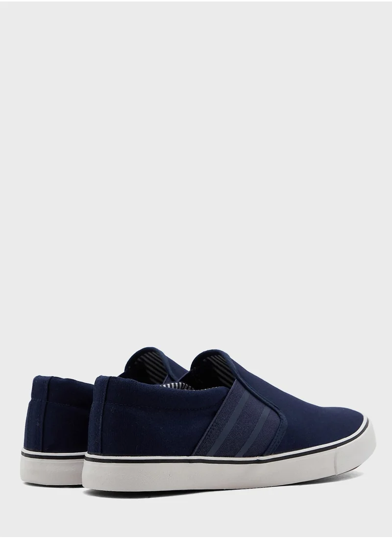 Seventy Five Canvas Slip Ons