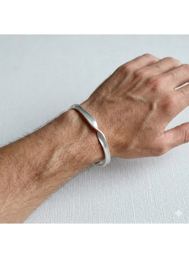 Luxuria An open twist bracelet made of stainless steel, featuring an elegant finish, and often suitable for both men and women. - Image 3