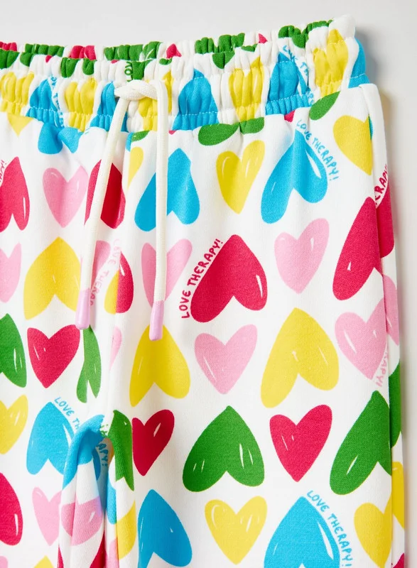 Ovs Fleece joggers with hearts print