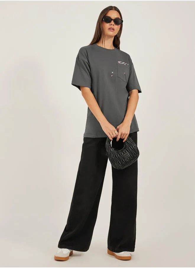 ستايلي Embroidered Pocket Round Neck Oversized T-Shirt