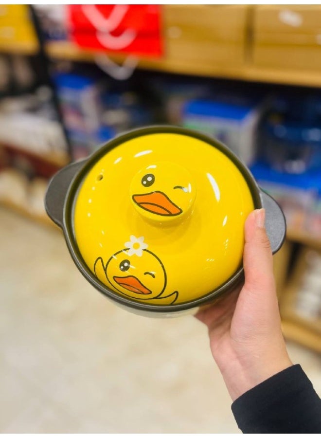✨ Cute Duck-Design Porcelain Pot  A distinctive pot that adds a touch of fun and elegance to your kitchen 🍲💛 Crafted from high-quality porcelain and featuring a cute, smiling duck design, it comes with an attractive yellow lid that retains heat and makes serving look delightful.  🐥 Specifications:  Material: Durable, high-quality porcelain Capacity: 1.8 liters Color: Black with a yellow lid Design: Cute, playful duck theme Heat Resistance: Suitable for hot dishes Easy Cleaning: Smooth, easy-to-wash surface - Image 1
