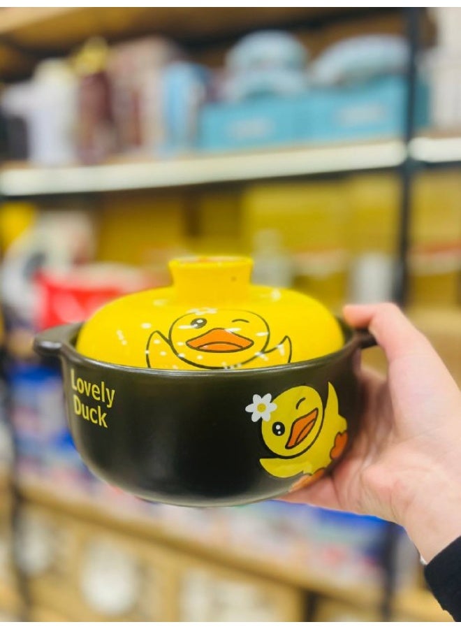 ✨ Cute Duck-Design Porcelain Pot  A distinctive pot that adds a touch of fun and elegance to your kitchen 🍲💛 Crafted from high-quality porcelain and featuring a cute, smiling duck design, it comes with an attractive yellow lid that retains heat and makes serving look delightful.  🐥 Specifications:  Material: Durable, high-quality porcelain Capacity: 1.8 liters Color: Black with a yellow lid Design: Cute, playful duck theme Heat Resistance: Suitable for hot dishes Easy Cleaning: Smooth, easy-to-wash surface - Image 2