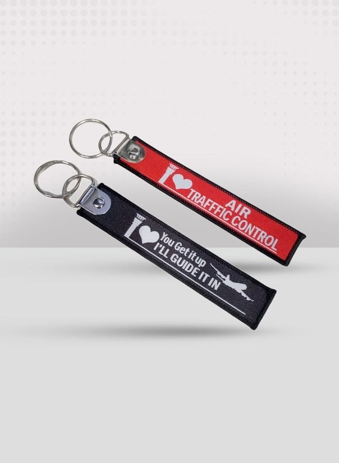فايتر جيفتس ATC سلسلة مفاتيح من القماش باللونين الأحمر والأسود