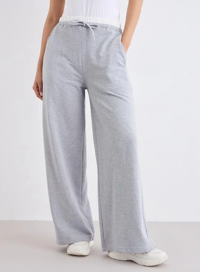 ستايلي جوغر بأرجل واسعة وأربطة