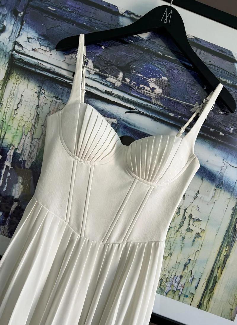 Lichi Midi dress with creased bodice and pleated skirt
