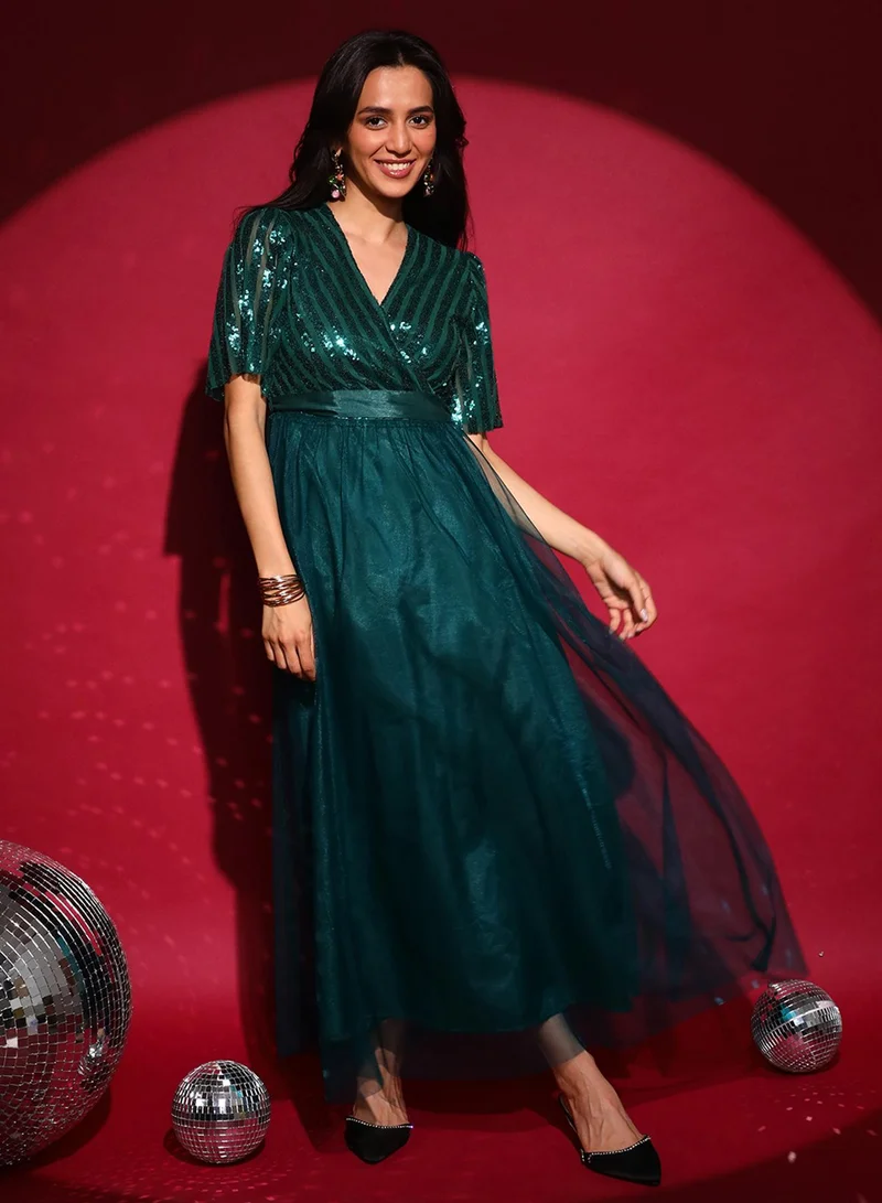 بينيا كولادا فستان طويل مزين بالترتر باللون الأخضر الزمردي للسيدات