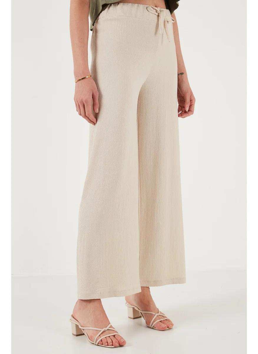 ليلا Waist-Tie Relaxed Cut Crinkle Fabric Trousers Women's Trousers 5869016