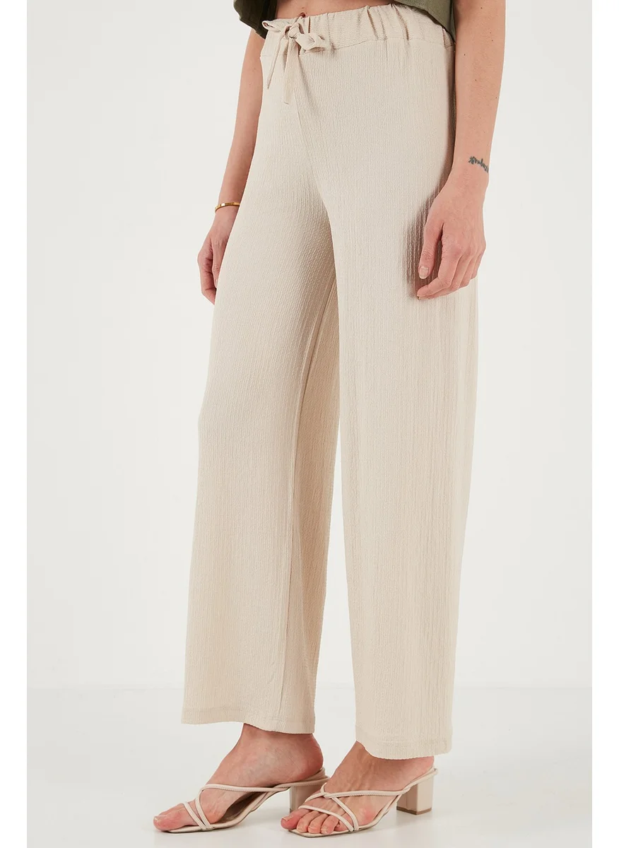 ليلا Waist-Tie Relaxed Cut Crinkle Fabric Trousers Women's Trousers 5869016