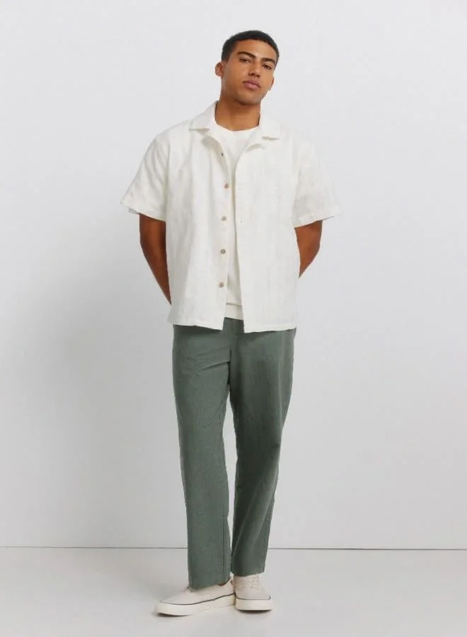 Springfield  1% cotton jacquard regular fit short sleeve bowling collar coconut button shirt for Men | Best Price UAE