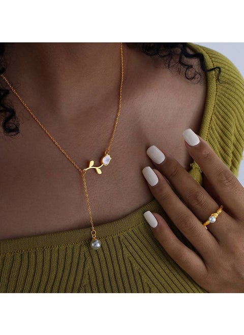 Gold Stainless Steel Necklace with an elegant rose design and a soft pearl touch, adding the charm of nature and the elegance of details to your look. A modern and unique design, lightweight and comfortable for daily wear and special occasions. A feminine touch that reflects your refined taste, shine with irresistible natural beauty.